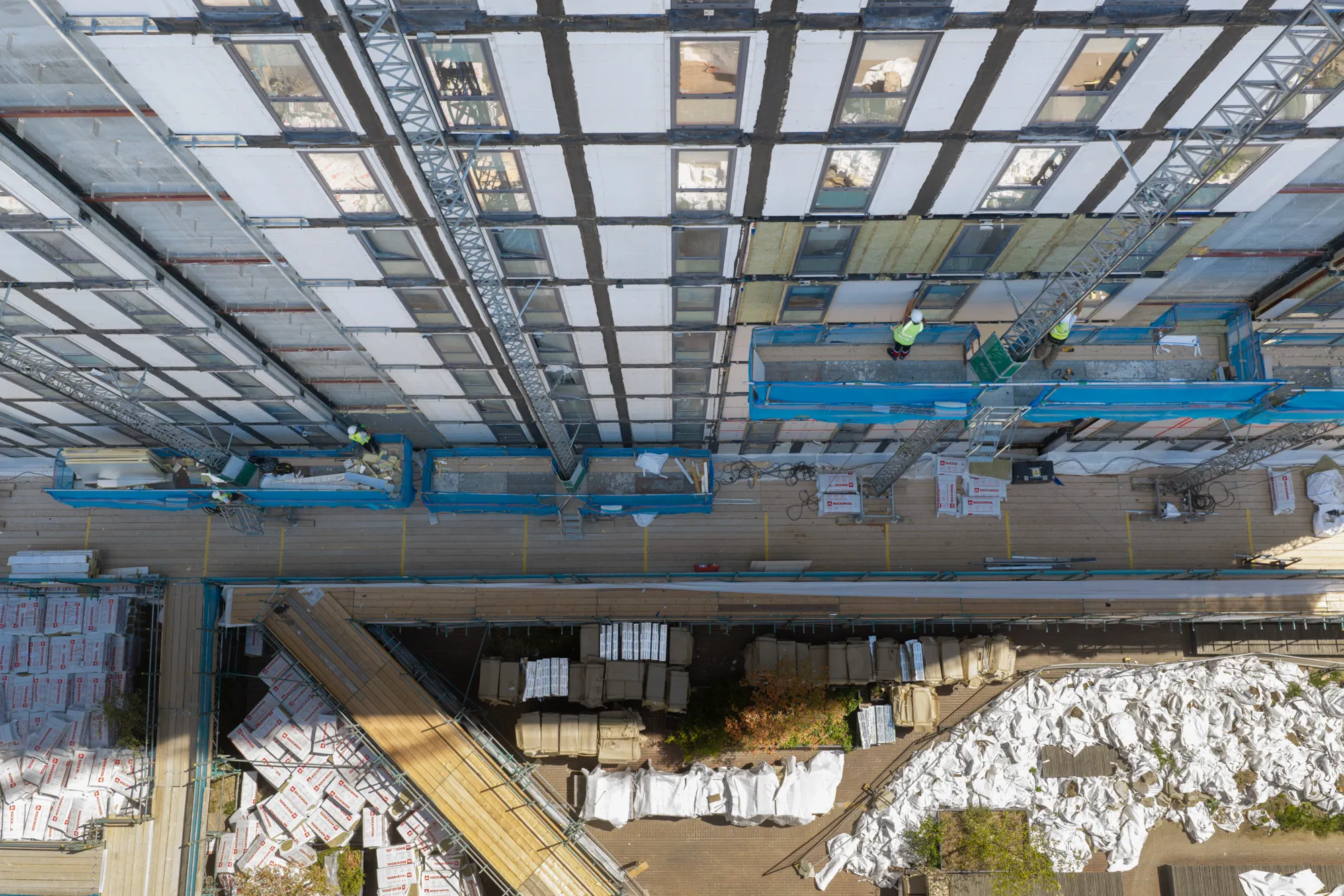 ukr-facades-grand-felda-house-wembley-project-aerial-10 Aerial view looking down the multi-storey external facade during construction at Grand Felda House in Wembley