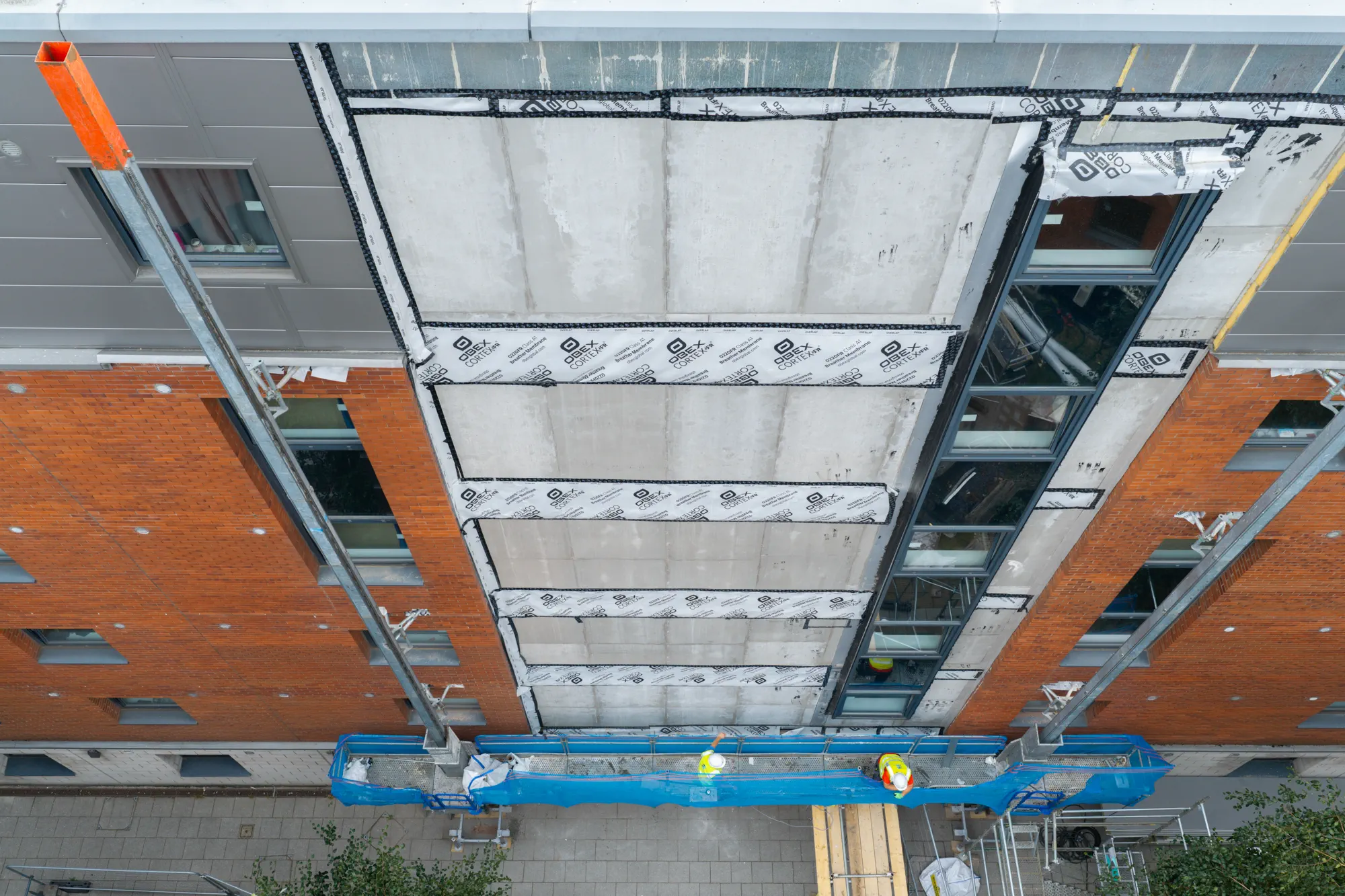 ukr-facades-sheffield-3-sheffield-project-aerial-5 Close aerial view of exposed external wall construction during facade works on 80 Hoyle Street in Sheffield