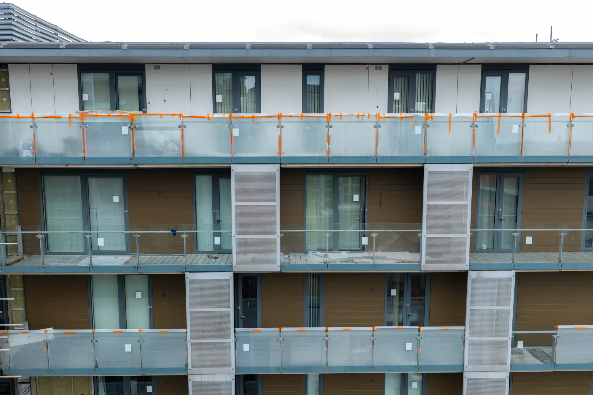 Close aerial view of balconies and external facade detailing at Spectrum Apartments in Salford