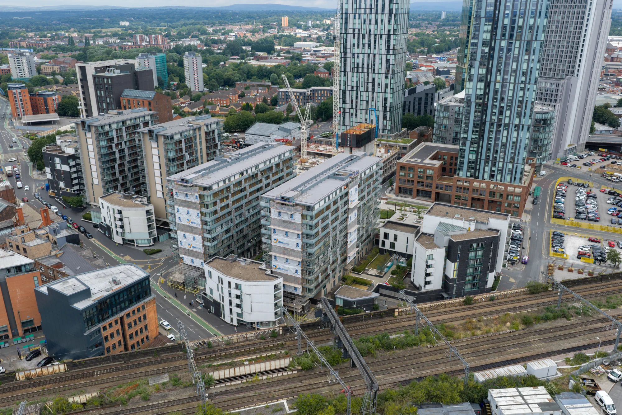 ukr-facades-spectrum-apartments-salford-project-aerial-3 Wide aerial view of Spectrum Apartments and surrounding high-rise residential developments in Salford