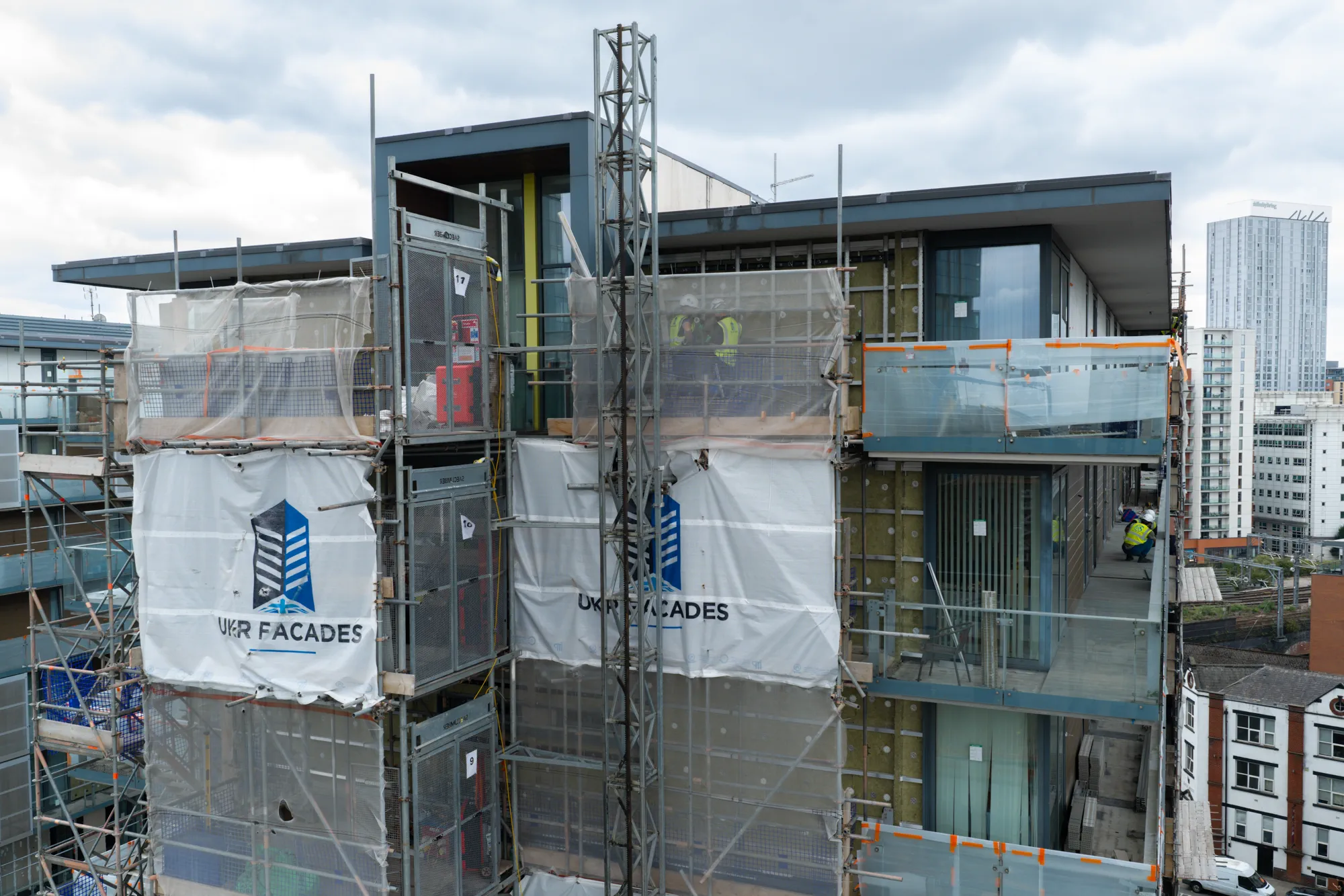 ukr-facades-spectrum-apartments-salford-project-aerial-30 UKR Facades scaffolding and external wall works around upper balconies at Spectrum Apartments in Salford