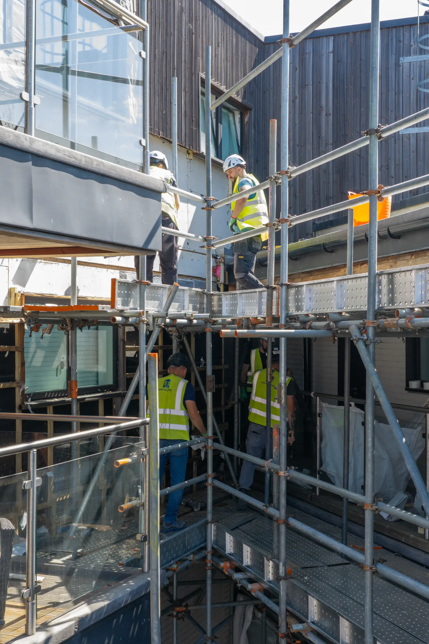 ukr-facades-the-central-london-project-aerial-11 UKR Facades operative working from scaffolding during facade remediation at The Central in London