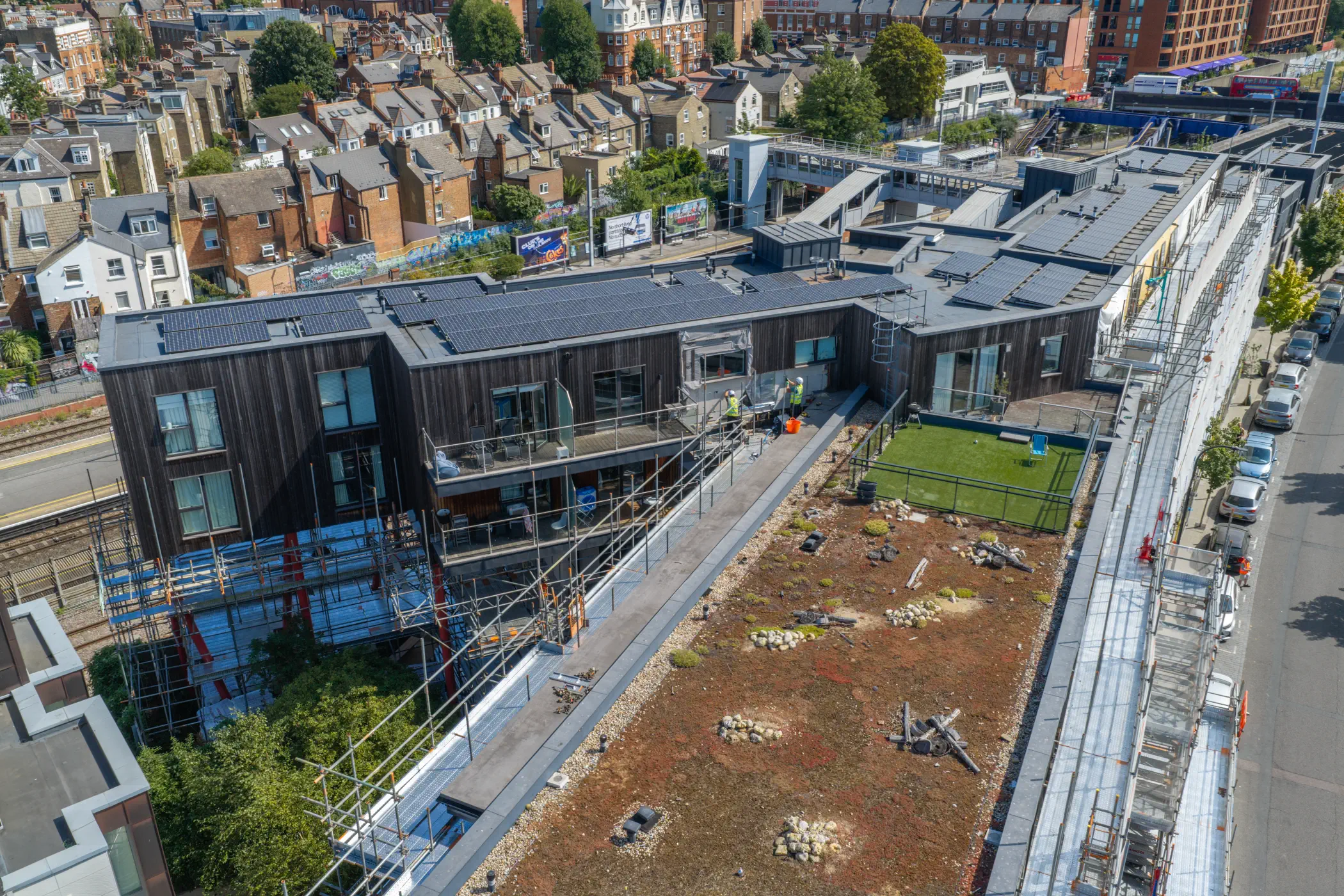 ukr-facades-the-central-london-project-aerial-5 Aerial view across the upper levels of The Central in London during facade remediation works