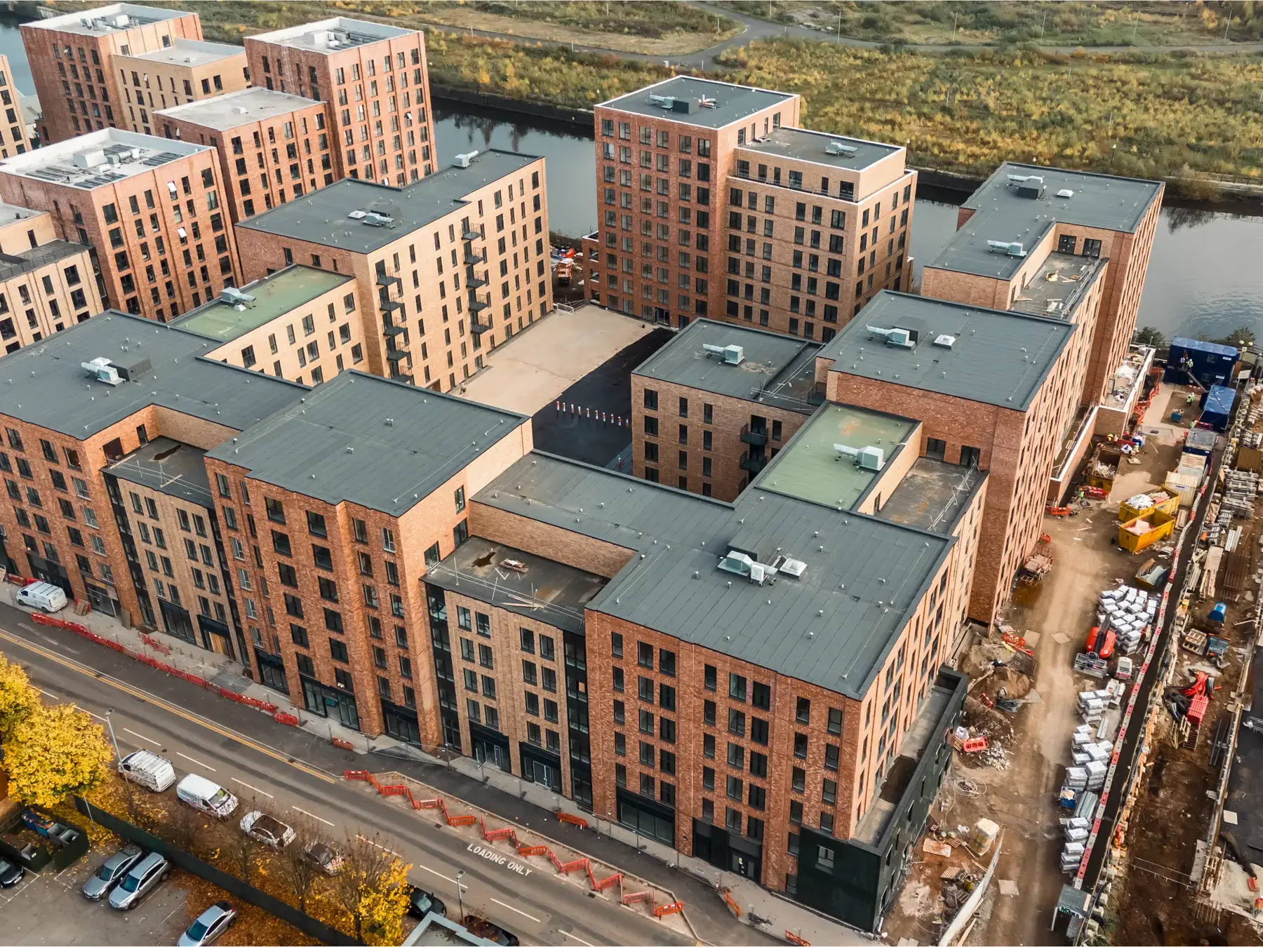 Aerial view of completed Bridgewater Wharf new-build residential facades in Salford
